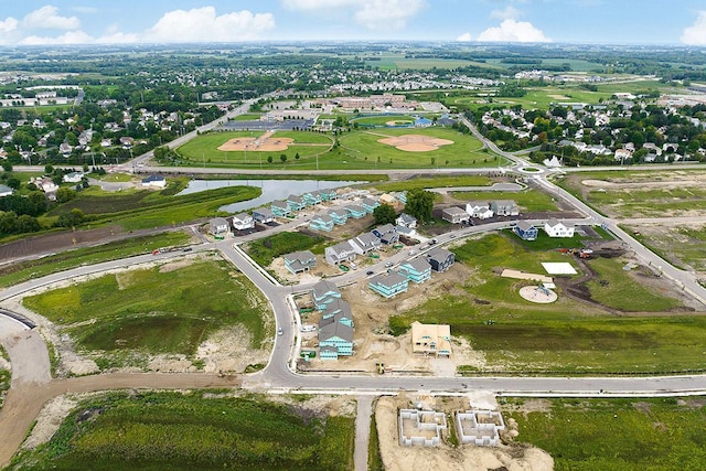 aerial view featuring a water view and a residential view