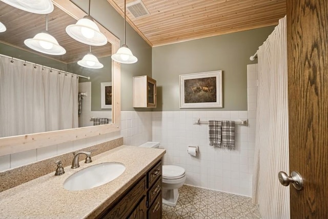 16523 243rd Ave NW, Orrock Twp, MN 55309 - full bath featuring wooden ceiling, tile walls, toilet, vanity, and curtained shower