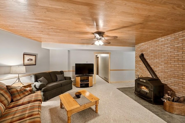 16523 243rd Ave NW, Orrock Twp, MN 55309 - carpeted living area with wood ceiling, a ceiling fan, brick wall, and a wood stove