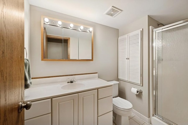 16523 243rd Ave NW, Orrock Twp, MN 55309 - full bathroom with a stall shower, vanity, toilet, and tile patterned flooring