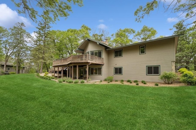16523 243rd Ave NW, Orrock Twp, MN 55309 - back of property featuring a wooden deck and a lawn