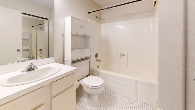 full bathroom with  shower combination, toilet, tile patterned flooring, and vanity