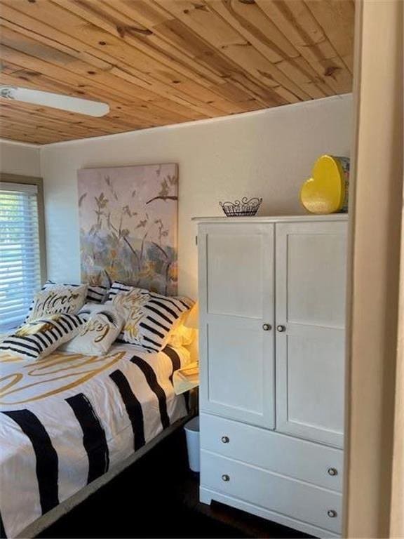 bedroom with wooden ceiling