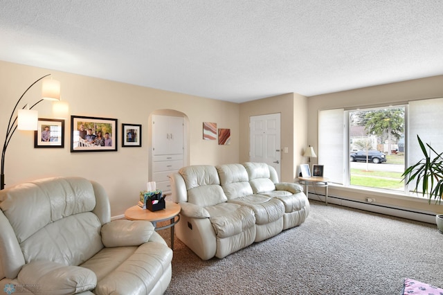 carpeted living room with arched walkways, a textured ceiling, and baseboard heating