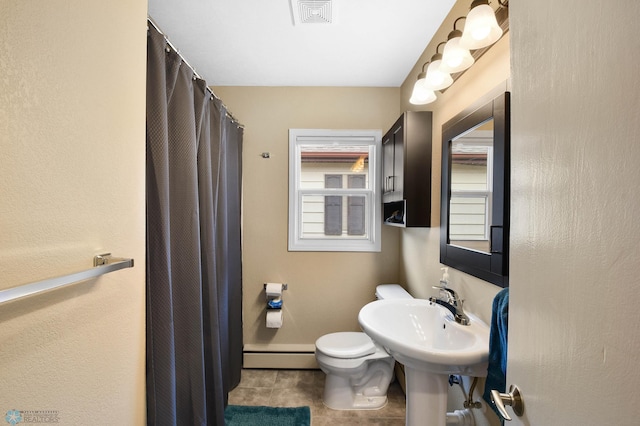 full bathroom with toilet, tile patterned floors, curtained shower, a baseboard radiator, and visible vents