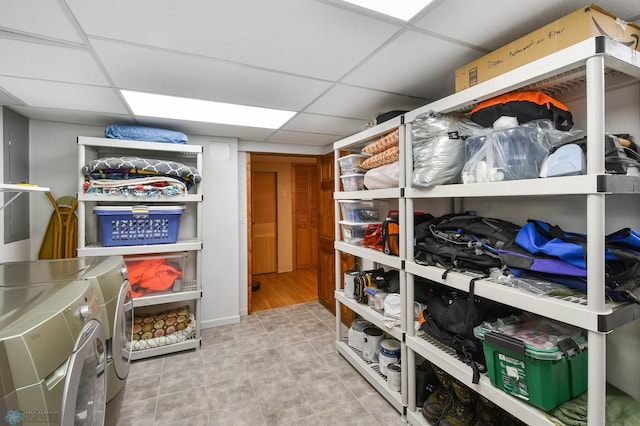 storage room with independent washer and dryer