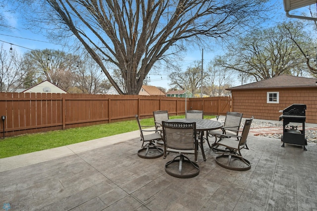 view of patio / terrace with a fenced backyard and outdoor dining area