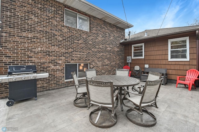 view of patio / terrace featuring outdoor dining area and grilling area