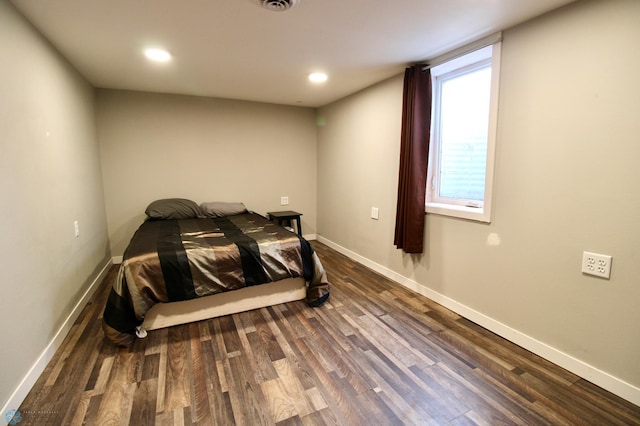 bedroom featuring recessed lighting, baseboards, and wood finished floors