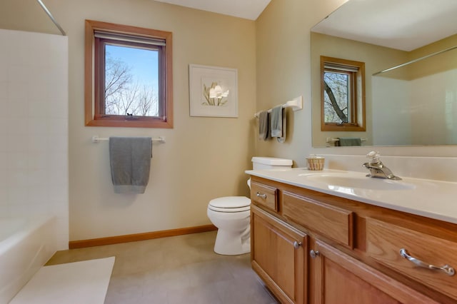 full bath with baseboards, washtub / shower combination, toilet, and vanity