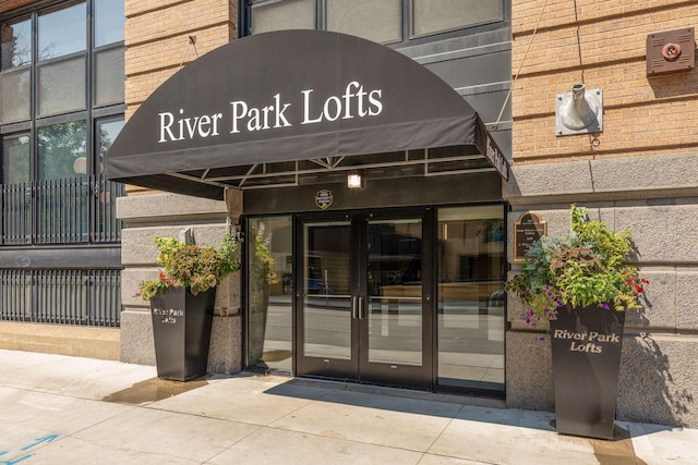 406 Wacouta St Unit 707, Saint Paul, MN 55101 - view of exterior entry featuring brick siding