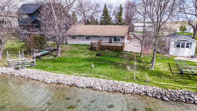 11544 Lake Eunice Rd, Detroit Lakes, MN 56501 - rear view of property featuring a deck with water view and a yard