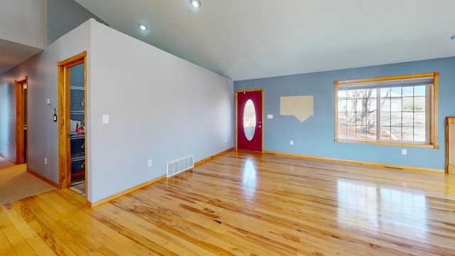 11544 Lake Eunice Rd, Detroit Lakes, MN 56501 - unfurnished living room featuring wood-type flooring and baseboards