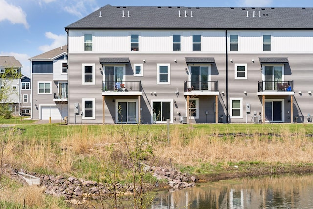 8678 London Cir NE Unit B, Blaine, MN 55449 - back of house with a water view and central AC