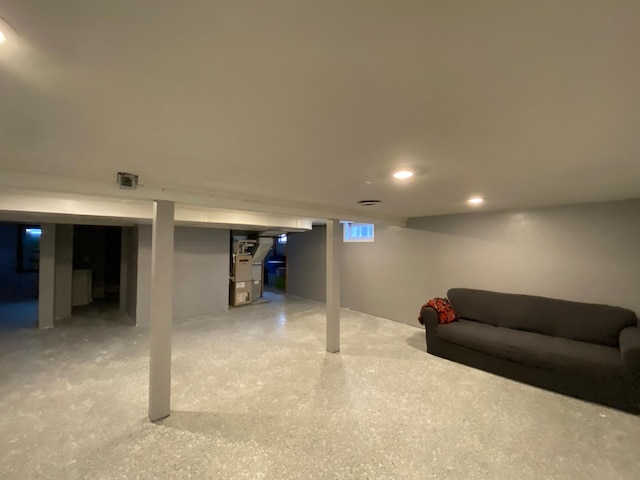 basement featuring recessed lighting