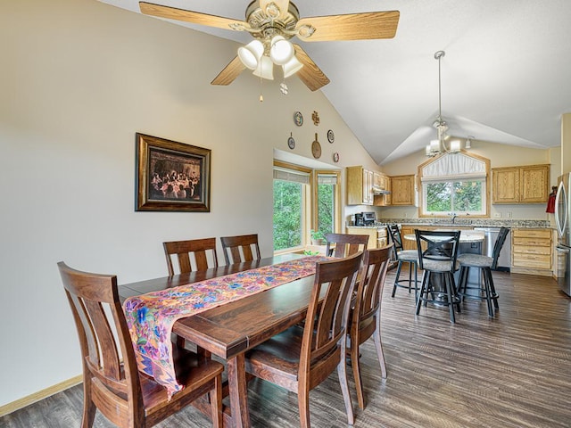 8918 Prestwick Pkwy N, Brooklyn Park, MN 55443 - dining area featuring dark wood-style floors, vaulted ceiling, and a ceiling fan