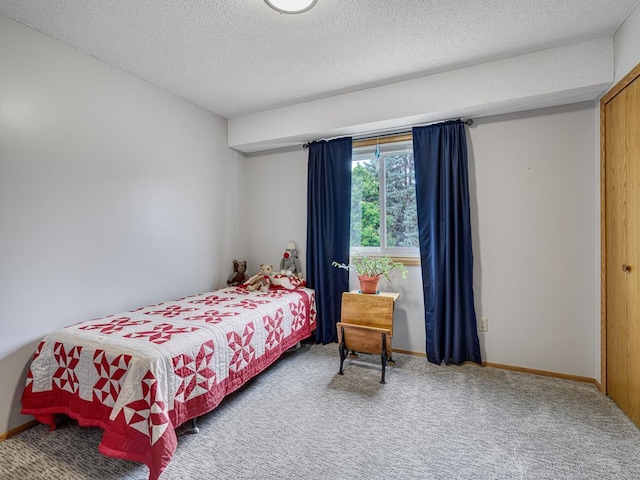 8918 Prestwick Pkwy N, Brooklyn Park, MN 55443 - bedroom featuring carpet floors and a textured ceiling