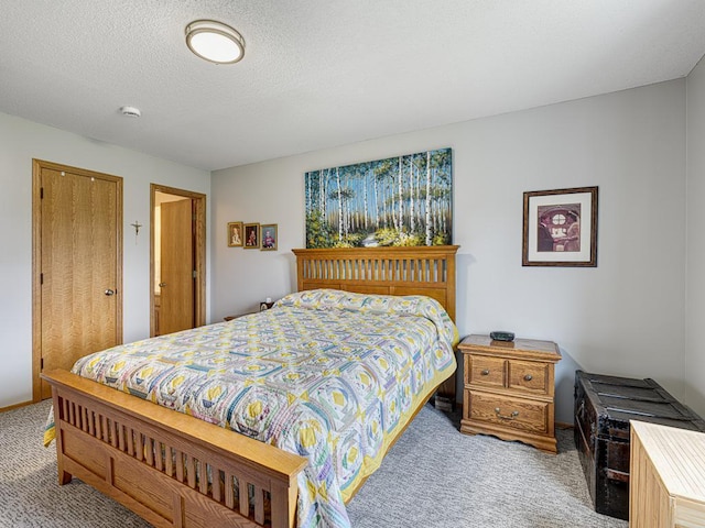 8918 Prestwick Pkwy N, Brooklyn Park, MN 55443 - bedroom with light colored carpet and a textured ceiling