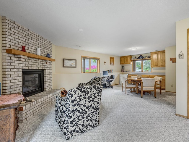 8918 Prestwick Pkwy N, Brooklyn Park, MN 55443 - living area with light carpet and a fireplace
