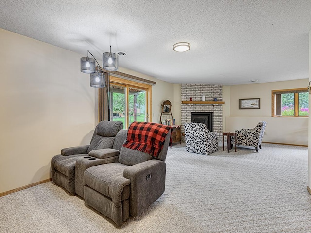 8918 Prestwick Pkwy N, Brooklyn Park, MN 55443 - living room featuring carpet, healthy amount of natural light, a brick fireplace, and a textured ceiling