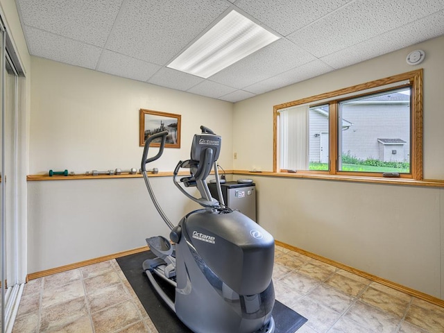 8918 Prestwick Pkwy N, Brooklyn Park, MN 55443 - exercise area with a drop ceiling and baseboards