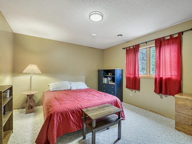 8918 Prestwick Pkwy N, Brooklyn Park, MN 55443 - bedroom featuring carpet and a textured ceiling