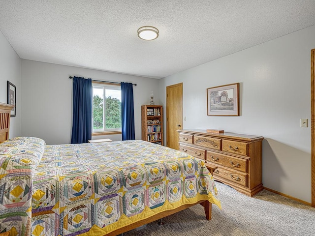 8918 Prestwick Pkwy N, Brooklyn Park, MN 55443 - bedroom with carpet flooring and a textured ceiling