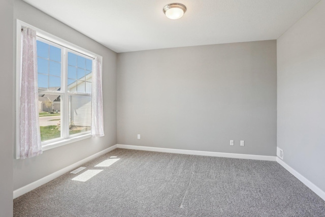 8441 152nd Ln NW, Ramsey, MN 55303 - empty room with carpet floors and baseboards