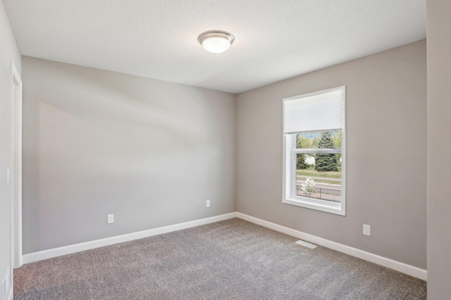 8441 152nd Ln NW, Ramsey, MN 55303 - carpeted empty room featuring baseboards