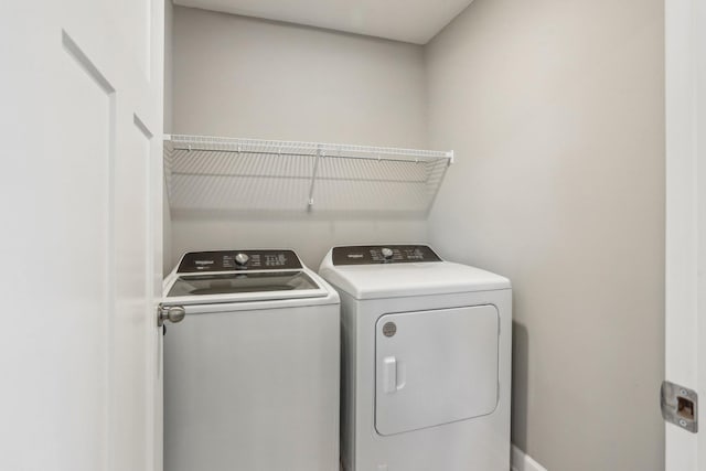 8441 152nd Ln NW, Ramsey, MN 55303 - laundry room featuring independent washer and dryer