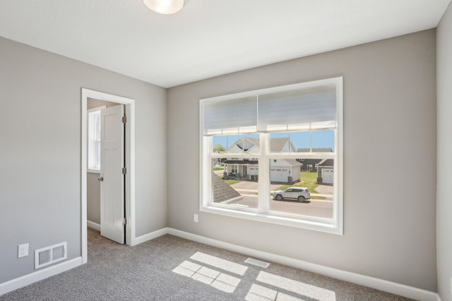8441 152nd Ln NW, Ramsey, MN 55303 - unfurnished bedroom featuring carpet and baseboards