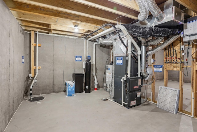 8441 152nd Ln NW, Ramsey, MN 55303 - unfinished below grade area featuring heating unit, water heater, and a water softener system