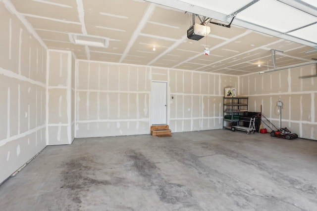 8441 152nd Ln NW, Ramsey, MN 55303 - garage featuring a garage door opener