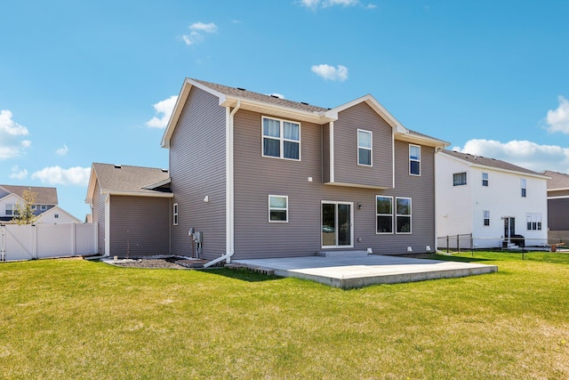 8441 152nd Ln NW, Ramsey, MN 55303 - rear view of house with a patio area