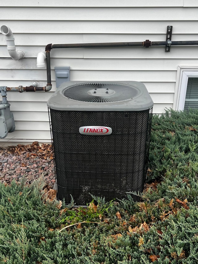 exterior details featuring cooling unit