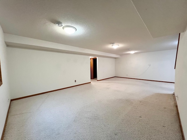 1647 8th Ave, Granite Falls, MN 56241 - finished below grade area featuring light colored carpet and baseboards