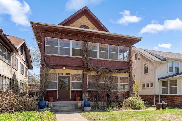 view of property with stucco siding and entry steps