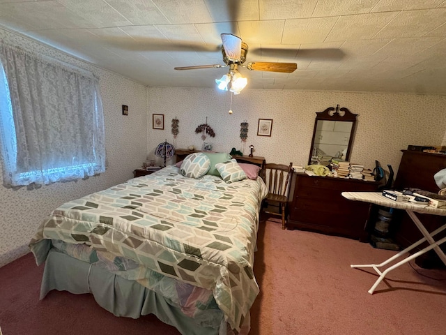 bedroom featuring carpet floors, ceiling fan, and wallpapered walls