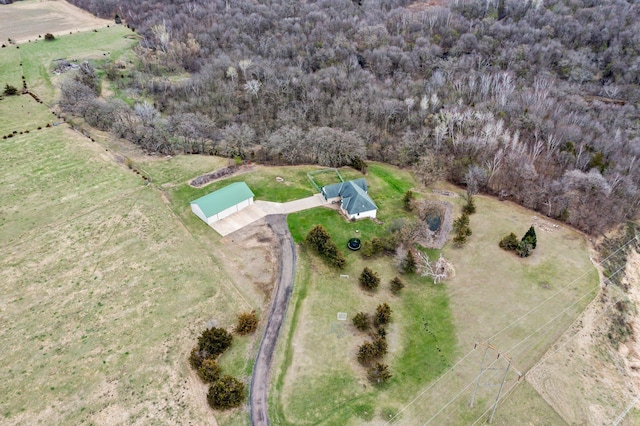 aerial view with a wooded view and a rural view