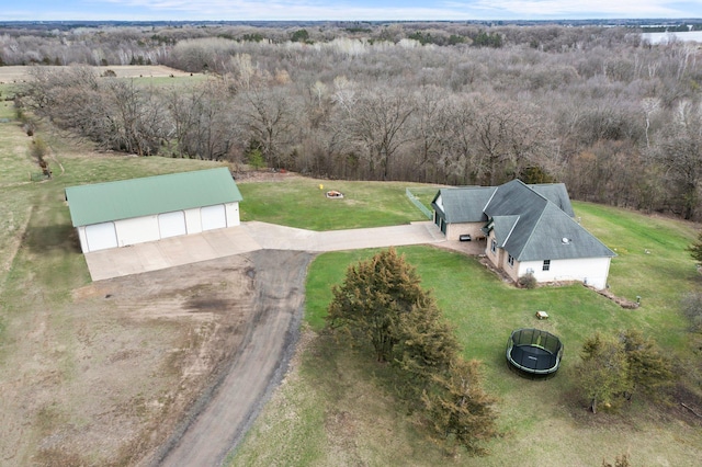 bird's eye view featuring a forest view