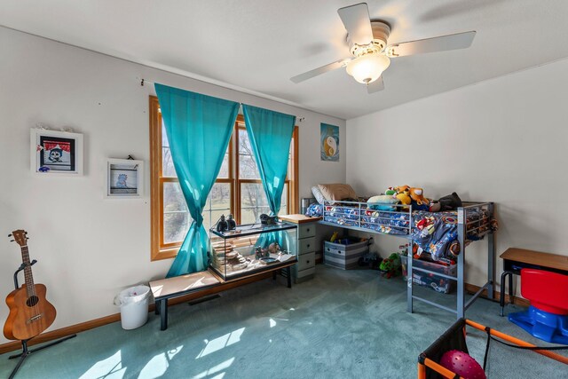 bedroom with baseboards, ceiling fan, and carpet