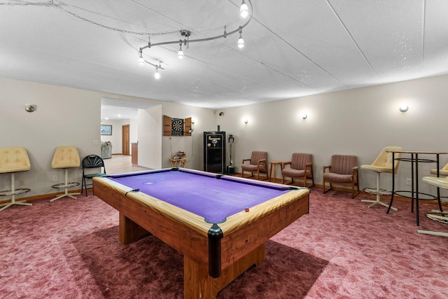 rec room with carpet floors, billiards, and a textured ceiling