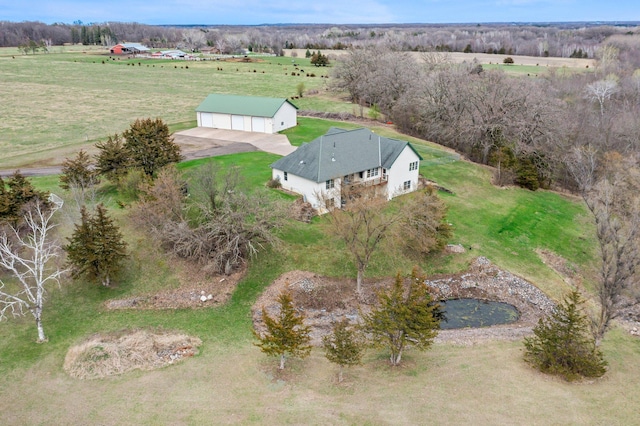 birds eye view of property featuring a rural view