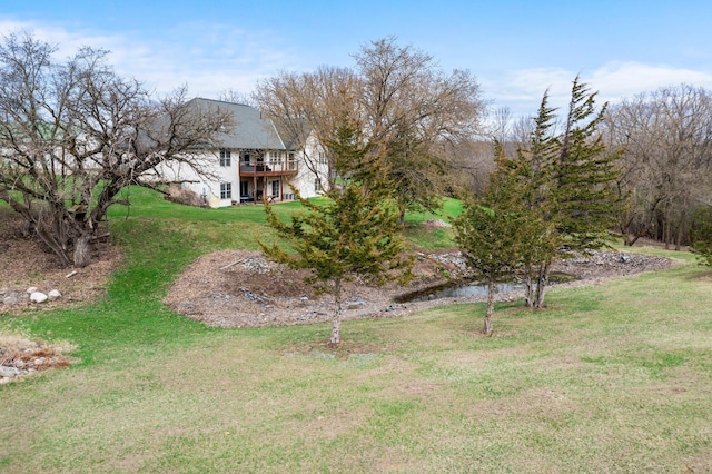 view of yard with a deck