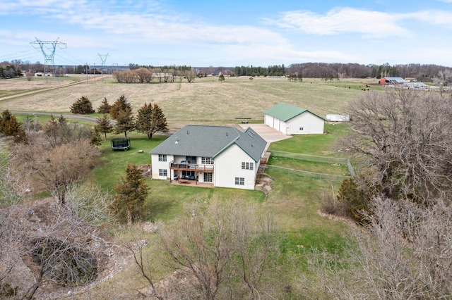 birds eye view of property featuring a rural view