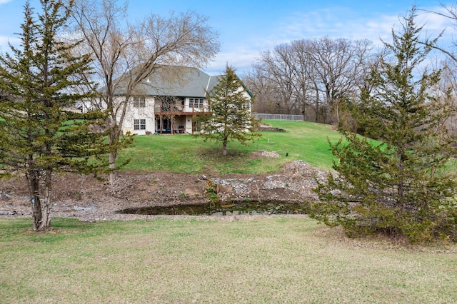 view of yard with a wooden deck