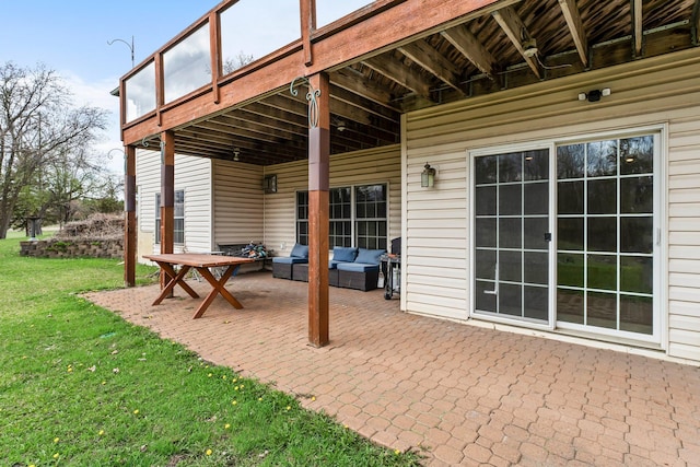 view of patio with an outdoor living space and a wooden deck
