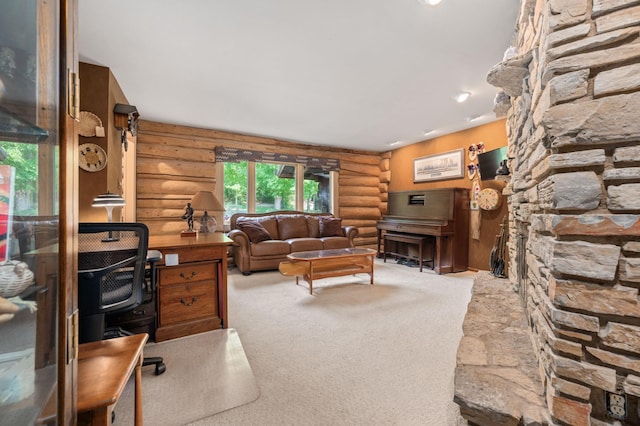 living room with carpet and rustic walls