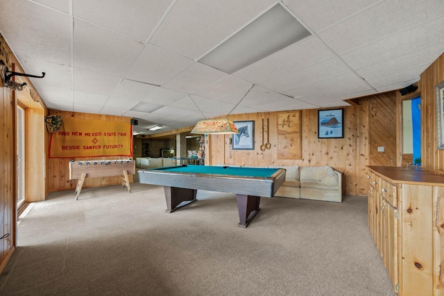 game room featuring billiards, carpet, a drop ceiling, and wooden walls