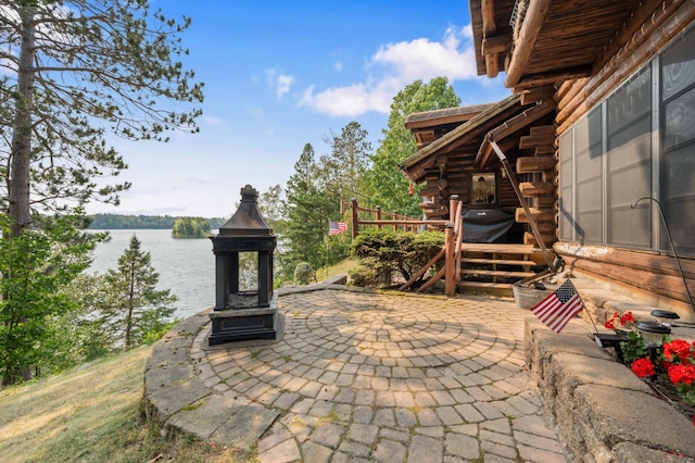 view of patio / terrace with a water view
